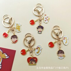 孫穎莎卓球のキーホルダーのスターの周辺の漫画は莎の頭の組み合わせのペンダントの王楚欽の贈り物を包んで飾ります。