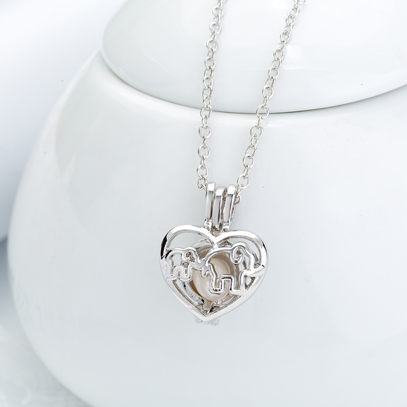 European And American Popular Personalized Mother And Child Concentric Necklace Pearl Heart Cage Diy Pendant Ornament display picture 1
