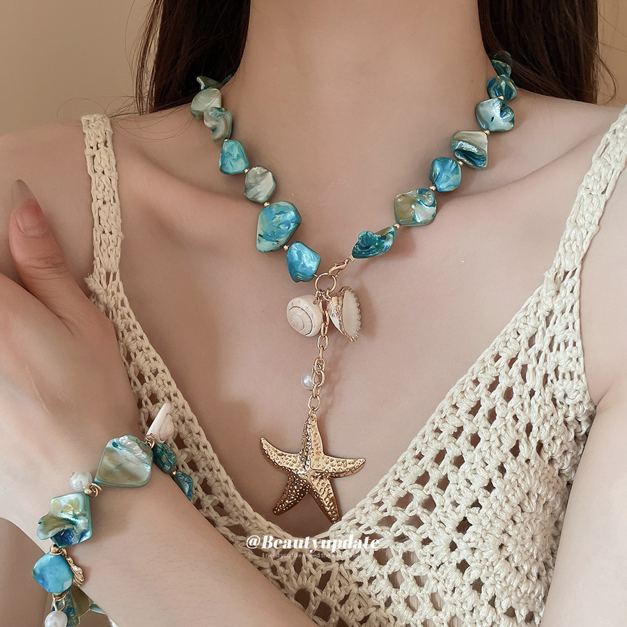 Concha Concha Concha Estrella de mar Juego de collar de perlas Estilo de vacaciones junto al mar Temperamento Cadena de clavícula Moda Collar de todo fósforo al por mayor