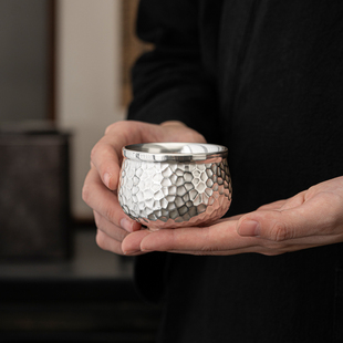 Retro light luxury silver hammer pattern Master Cup Xishi Silver Cup kung fu tea set 999 silver building Cup Tea Cup Silver Cup