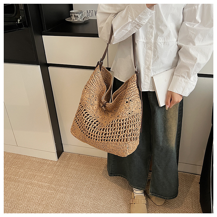 2025 New summer French laid-back seaside vacation bag, niche straw woven bag, hand-woven women's bag, large capacity undefined