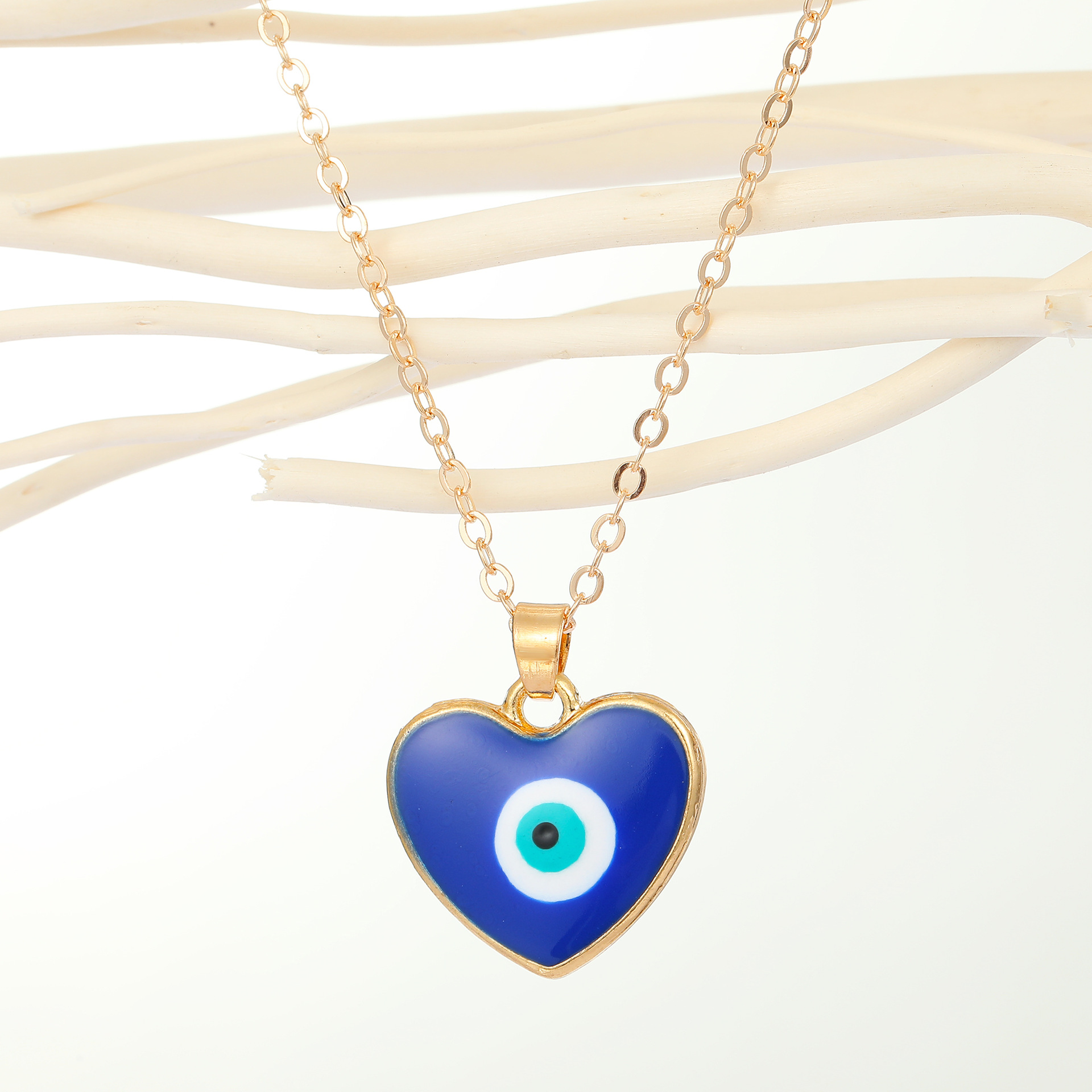 Fashion Peach Heart Round Devil's Eye Pendant Resin Necklace display picture 4