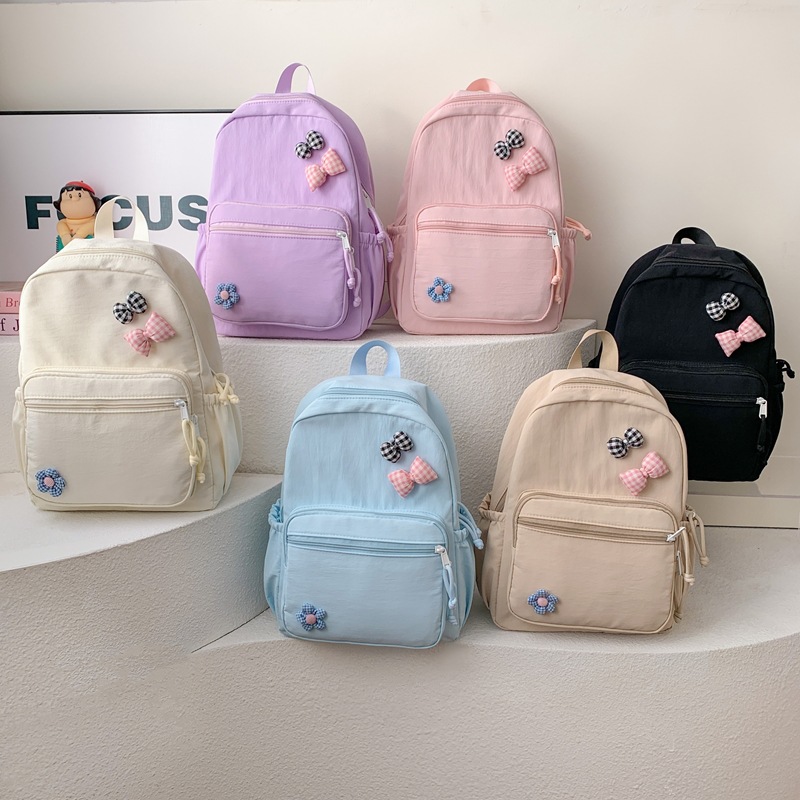 Mochila escolar de gran capacidad, lindas flores, arco, mochila para niños y niñas, 2026 nueva moda de mochila infantil
