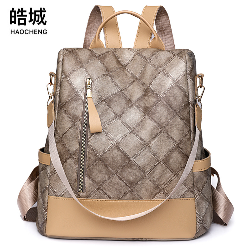 Venta al por mayor transfronteriza 2023 nueva mochila antirrobo casual para mujer moda a cuadros de cuero suave mochila de viaje de doble uso marea
