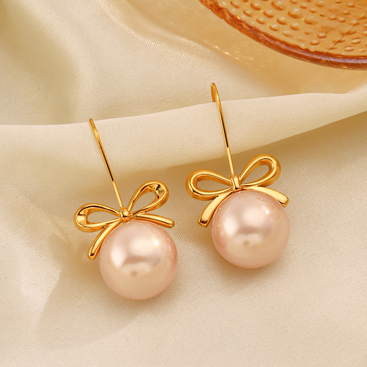 Brand fashionable retro earrings stainless steel with bow pearl