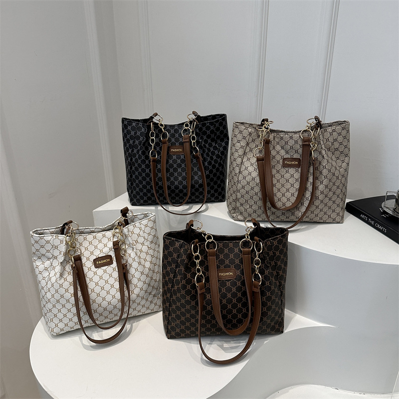 2025 primavera nuevo bolso Tote de gran capacidad bolso de mujer estampado retro popular bolso de hombro grande casual coreano