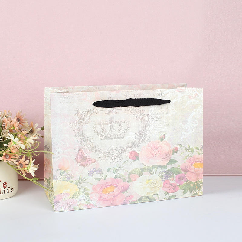 白卡纸袋现货化妆品服装包装牛皮手提袋现货LOGO礼品购物手拎袋子