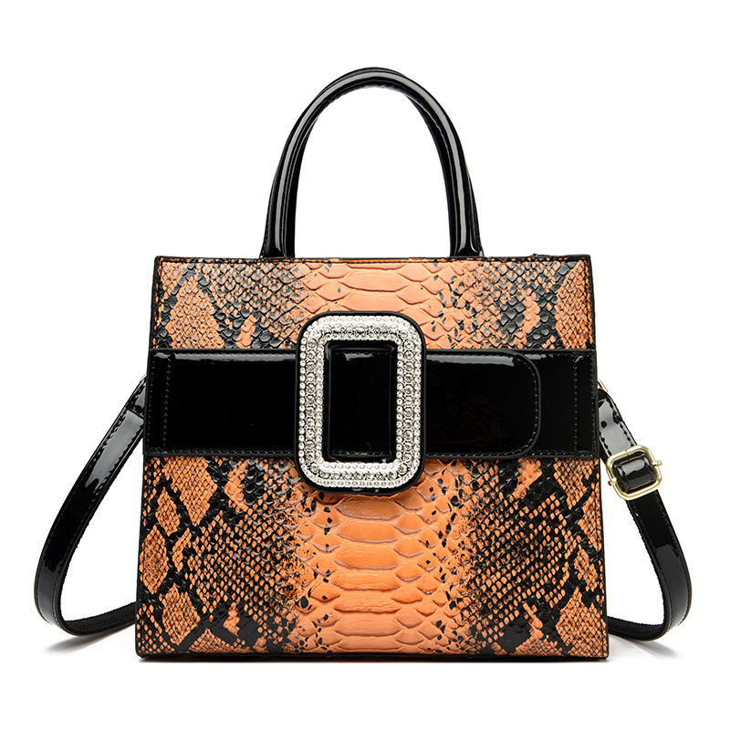 Nueva moda europea y americana todo-fósforo Luz de lujo en relieve patrón de piel de serpiente portátil hombro crossbody bolso de las mujeres