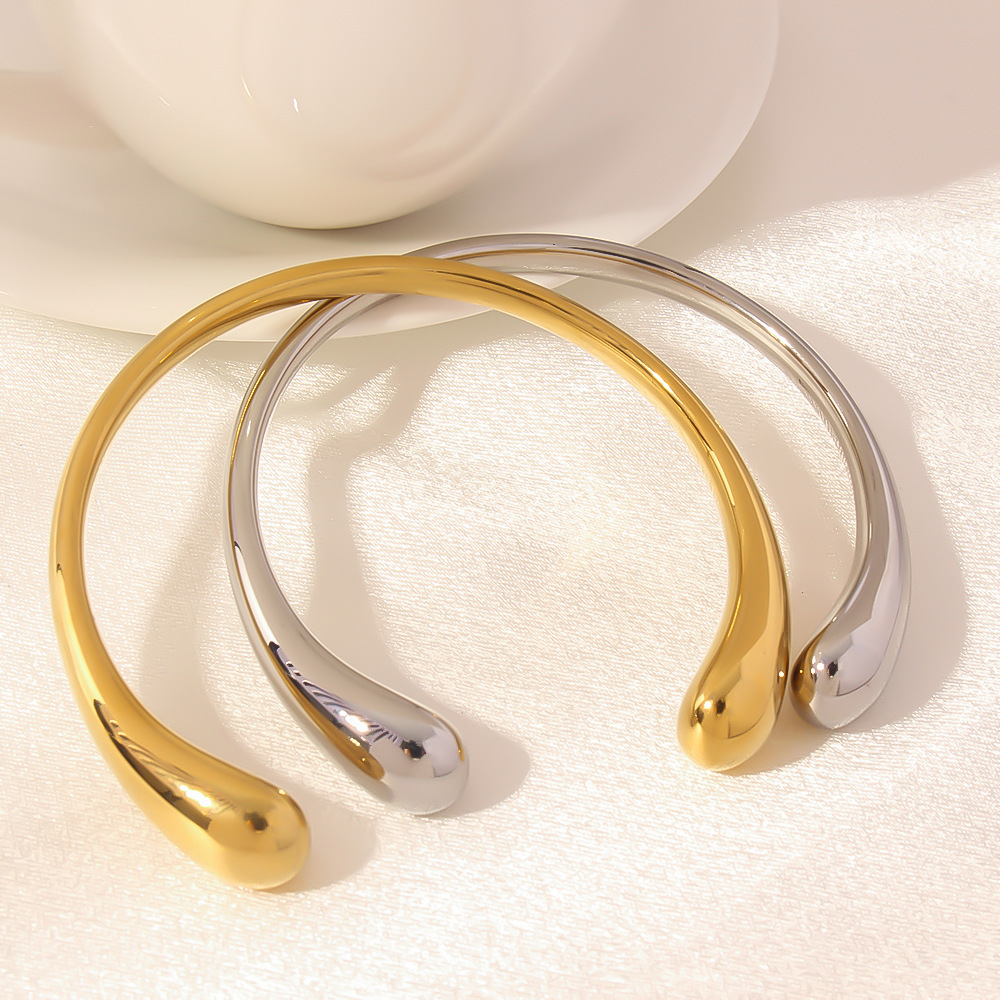 Joyas transfronterizas europeas y americanas exageradas gotas de agua simples acero titanio espejo brillante brazalete abierto de 18 quilates accesorios de mano de viento frío