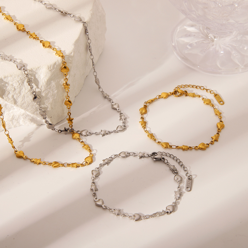 Acero de titanio de lujo ligero francés 18K oro real galvanoplastia amor estrella de cinco puntas collar transfronterizo pulsera INS juego de joyería al por mayor