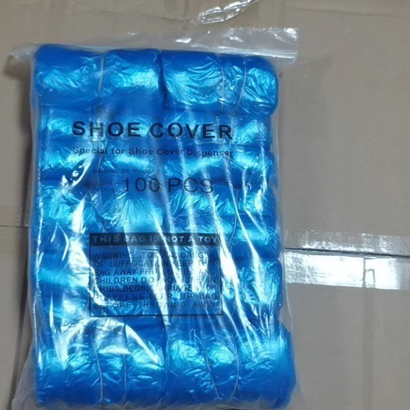 Fundas para zapatos con hebilla en T azul, 100 piezas por paquete