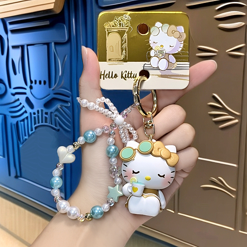 正版凯蒂猫悠闲假期钥匙扣书包汽车挂件HelloKitty金色黑色礼物女|undefined