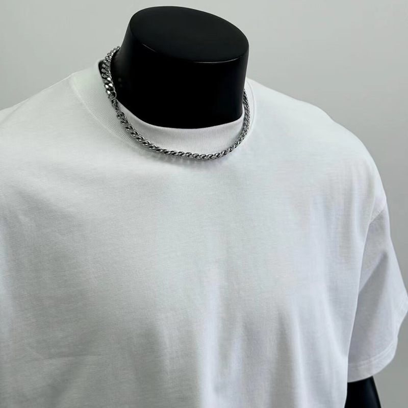 2025 marca pesada de moda de hombro caída camiseta de manga corta para hombres suelta oversize camiseta de base de pareja europea y americana