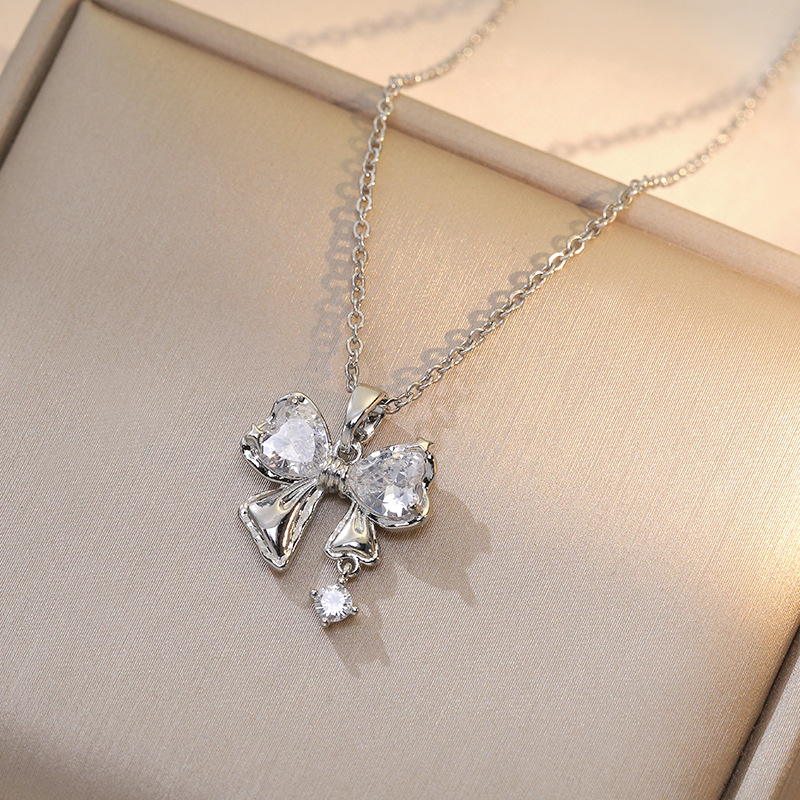 Titanium Steel Sweet Bow Knot Diamond Pendant Necklace display picture 7