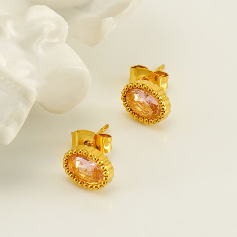 Transfronterizo nuevo acero inoxidable inserción de circón ovalado pequeños pendientes europeos y americanos simples de acero de titanio pendientes de lujo al por mayor