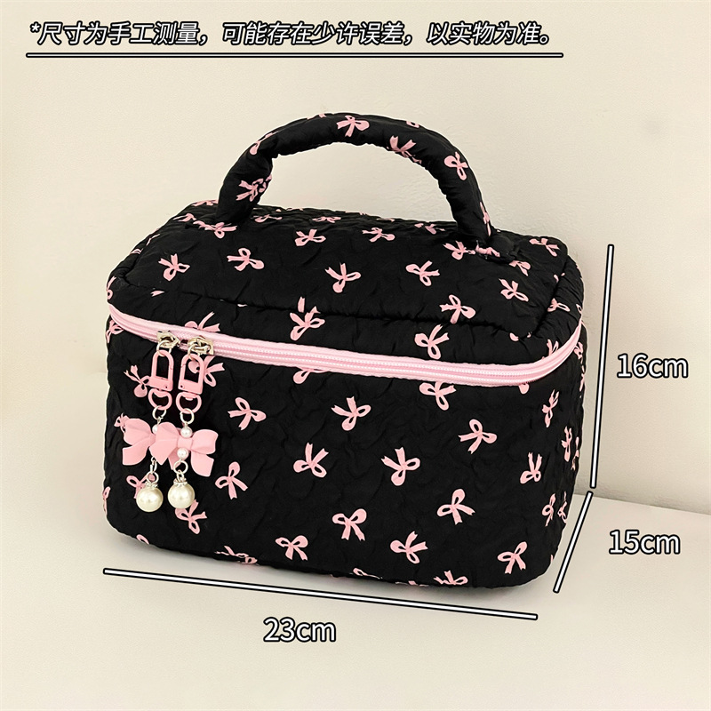 Nueva bolsa de almacenamiento de dormitorio de estudiantes de nicho de arco de maquillaje portátil de gran capacidad para salir a lavar