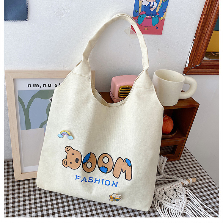 2021 Summer Japanese-style simple canvas bag, student backpack, single-shoulder handbag for going out, cartoon badge cotton bag undefined
