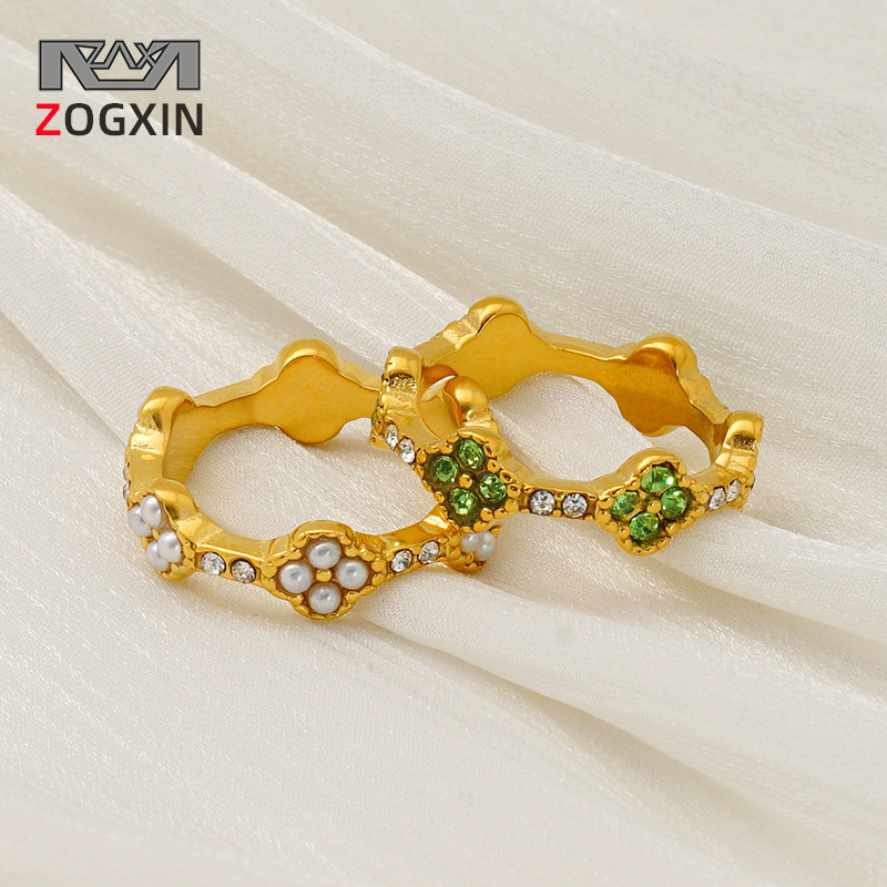 Anillo de trébol de cuatro hojas de acero inoxidable europeo y americano para mujer, personalidad de lujo ligera, anillo de perlas de todo fósforo, anillo de dedo de acero de titanio de alta calidad para mujer