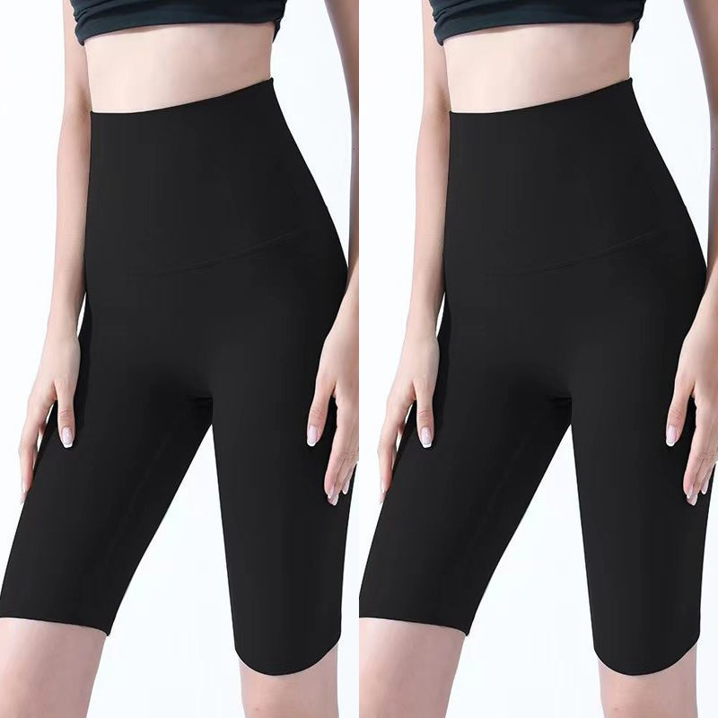 Pantalones cortos desnudos de mujer elásticos apretados para elevar las caderas de cinco puntos pantalones deportivos de secado rápido succión de sudor entrenamiento para correr fábrica de comercio de ping