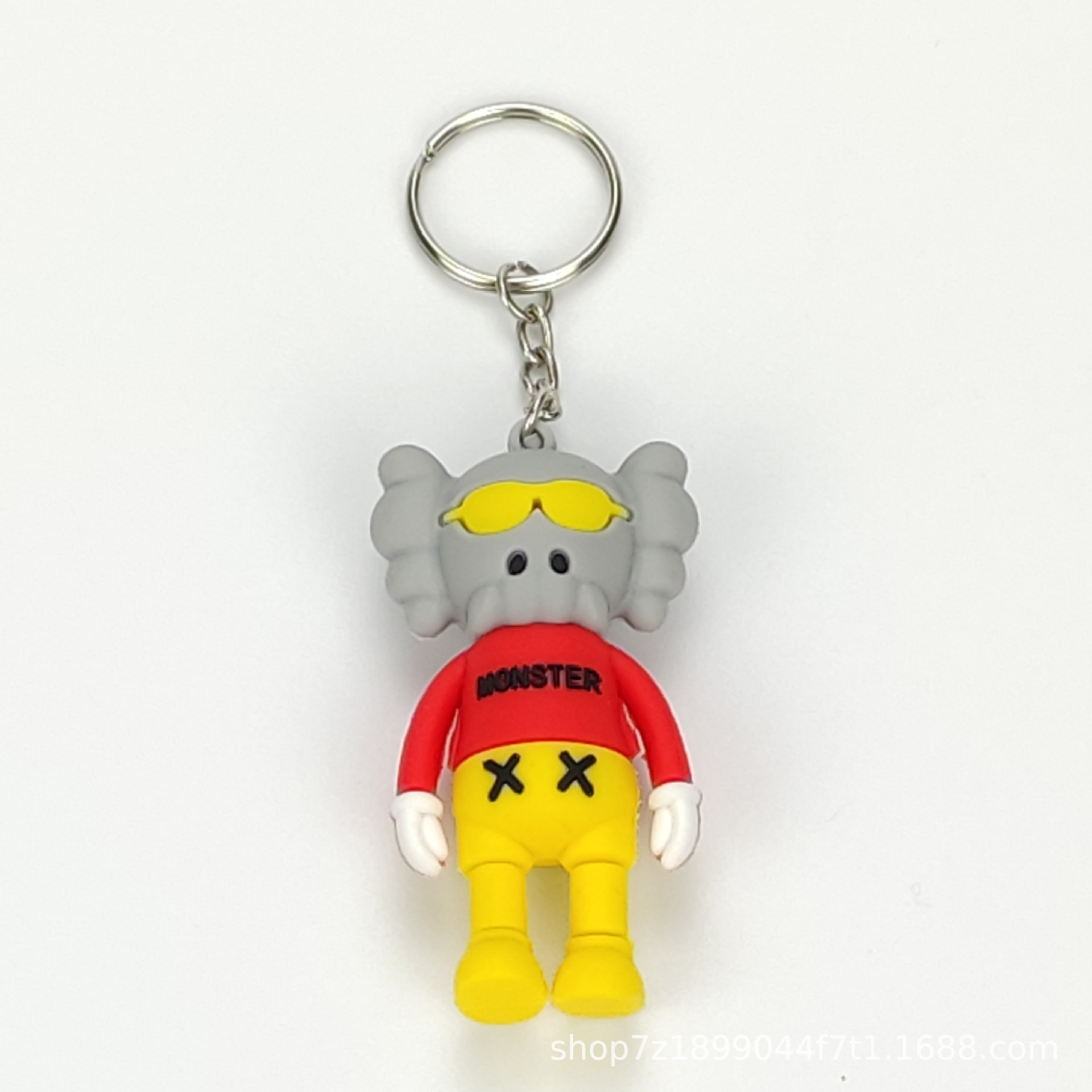 주황색과 빨간색 옷을 입은 코끼리 박사