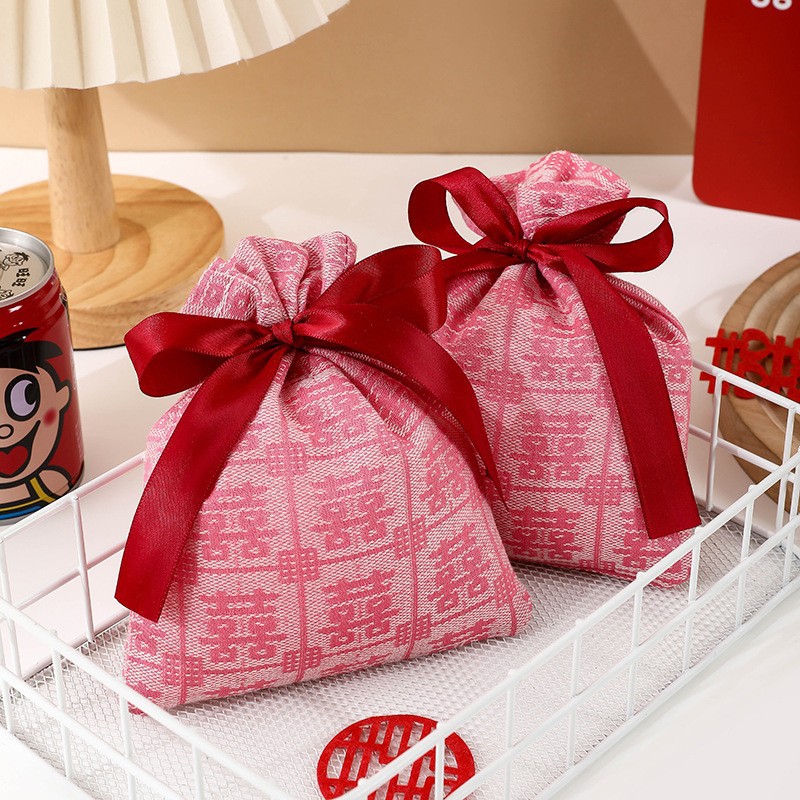 Boda nuevo estilo nicho estilo nacional Xi carácter bolsa de caramelo boda china sensación de mano caja de regalo boda caramelo caja de dulces