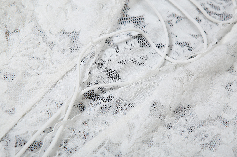 Detail shot of sleeve length and fabric texture