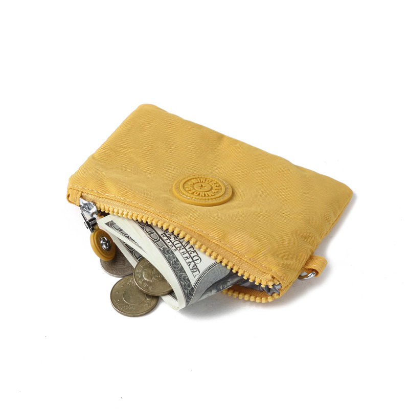 Bolso de tela de nylon de mujer simple bolso pequeño pequeño pequeño bolso de cambio delgado mini bolso de tarjeta de una sola capa de bolso de mano de mujer