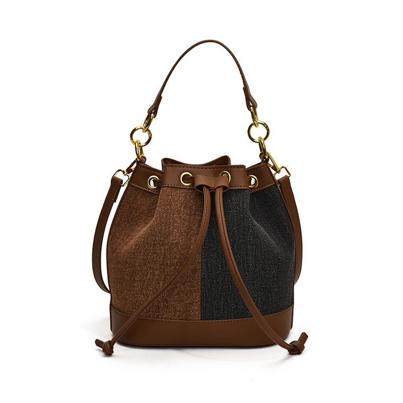 2025 otoño y invierno nuevo estilo coreano nicho bolso de cubo de agua mujer moda bolso de correa de color contraste de moda bolso de hombro