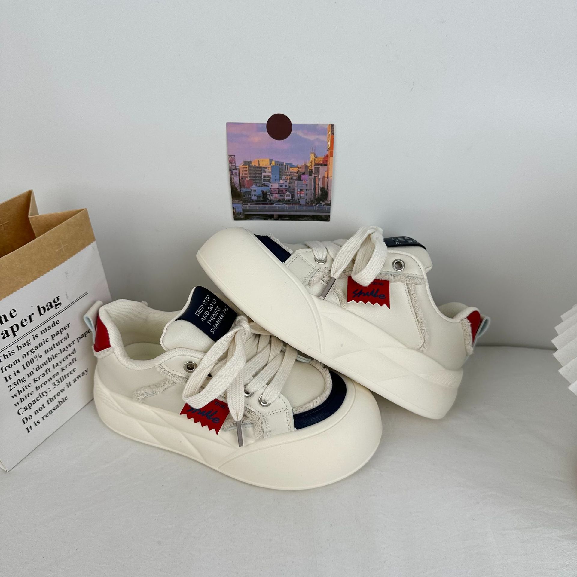 Zapatos de skate de fondo grueso y de altura baja de las niñas de la escuela deportiva universal zapatos de lona casuales 2025 primavera zapatos de mujer coreanos