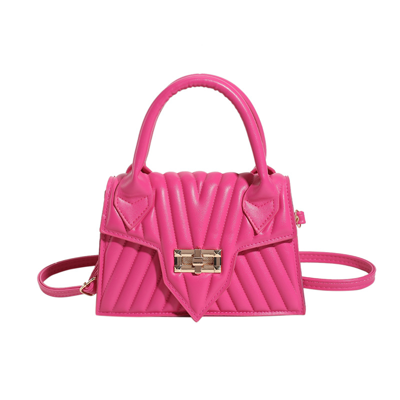 Textura 2025 nueva moda de impresión de estilo extranjero rotary-lock mochila de hombro casual color caramelo bolso de mano de mujer