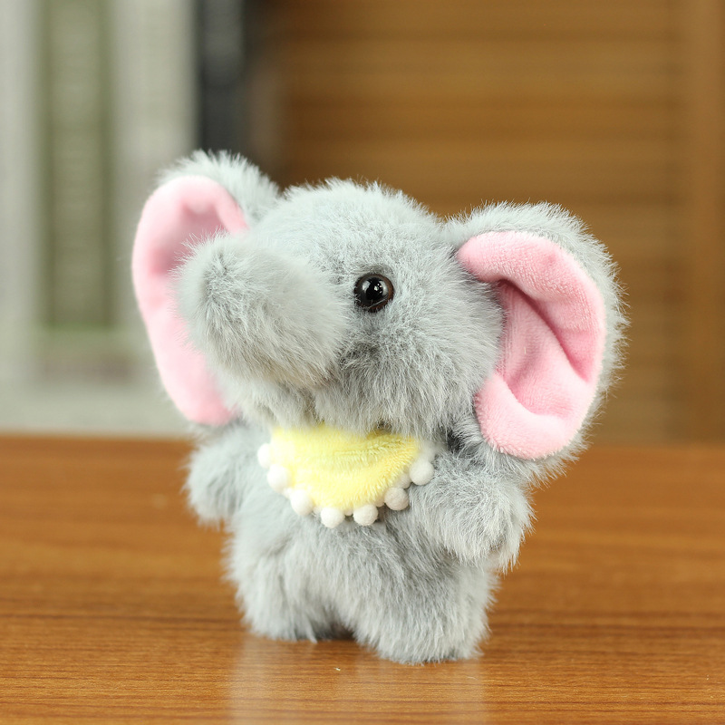 Douyin celebridad de Internet venta caliente bebé elefante llavero muñeca colgante peluche elefante muñeca regalo de lanzamiento de boda