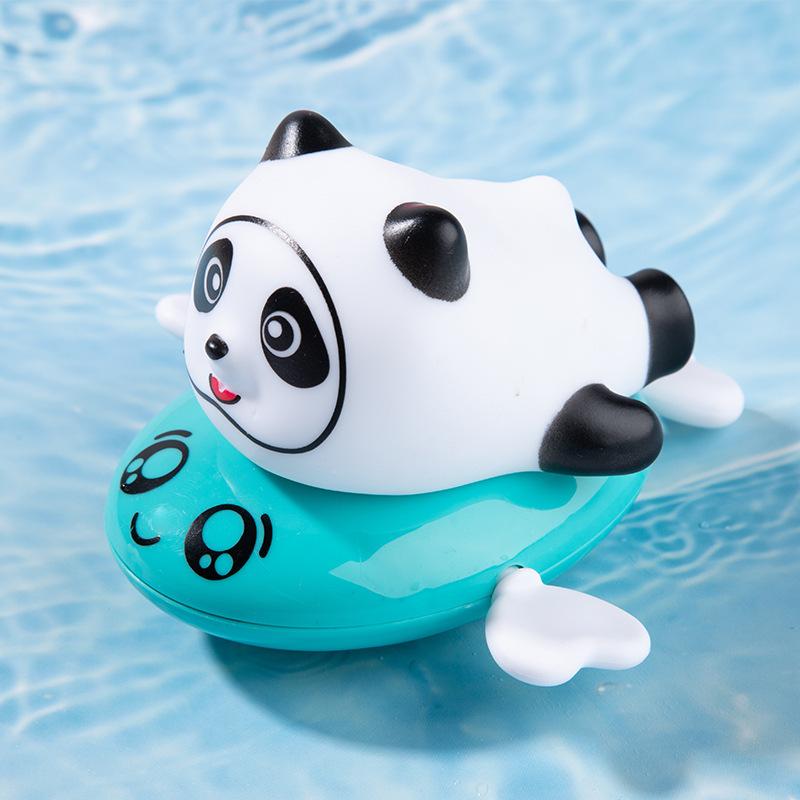 赤ちゃんのお風呂のおもちゃの子供の水泳の水遊びの小さいカメの花は男の子の女の子をこぼして音を震わせて水の小さいアヒルのおもちゃを遊びます。|undefined
