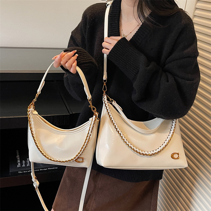 Bolso de mano transfronterizo de alta calidad, bolso de brazo brillante para mujeres, otoño y invierno 2025, nuevo tipo de bolso de hombro de cadena, bolso de moda.