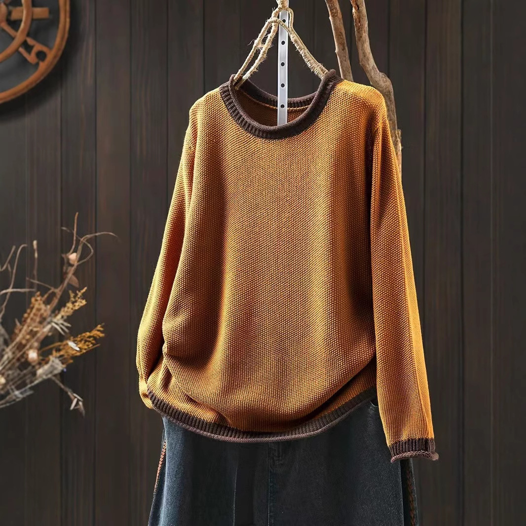 Demi-season knitted retro sweater with a round collar