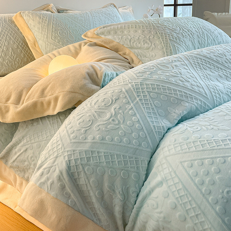 Cama de terciopelo de leche tallada de alta gama de lujo ligero de cuatro piezas de terciopelo de coral de invierno de doble cara más funda de edredón de sábana de terciopelo de tres piezas