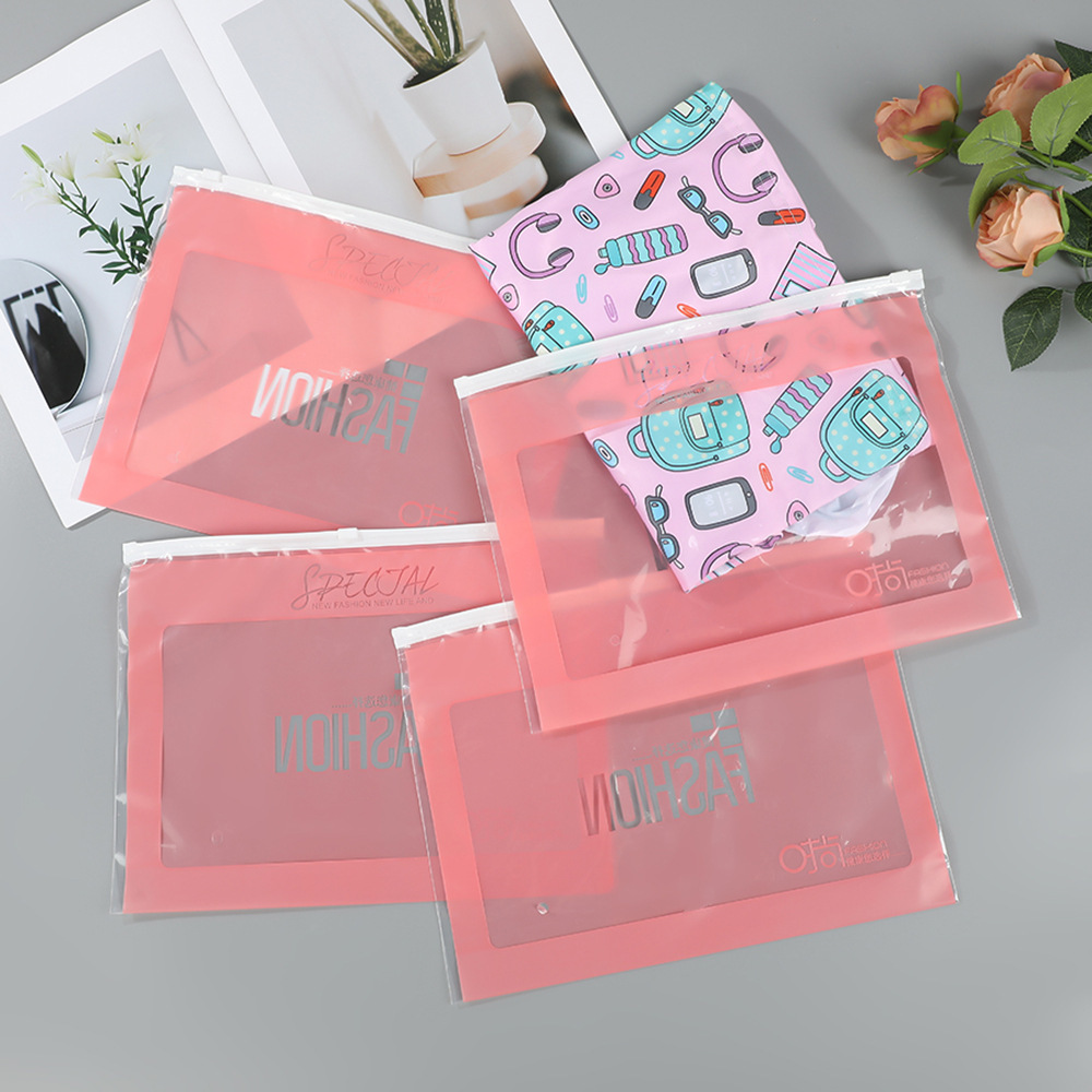 Bolsa con cremallera de ropa Bolsa con cremallera de crisantemo pequeño Bolsa de embalaje de camiseta Bolsa de ropa interior Bolsa de ropa PE esmerilada pequeña bolsa ziplock