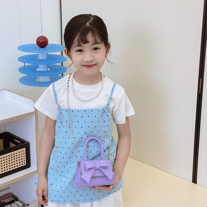 Bolso de princesa de estilo occidental Bolso de hombro para niña con lazo lindo de color sólido simple