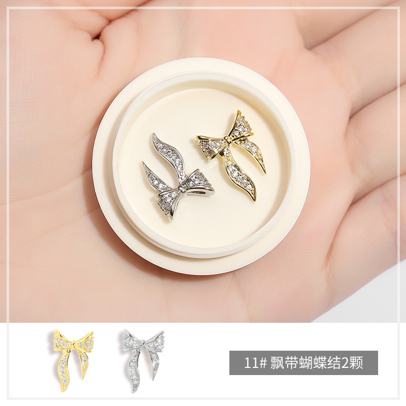 Online popular hielo transparente Aurora mariposa joyería cristal blanco piedra tridimensional uñas diamante Super Flash rhinestone uñas joyería