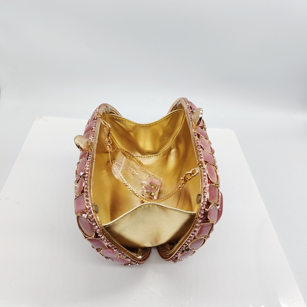 Sirena nueva piedra rosa ojo de gato bolso de banquete de metal hueco bolso de banquete de diamantes bolso de mano de Europa y América