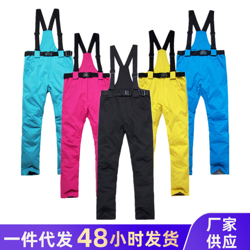 Nuevos pantalones de combate al aire libre hombres y mujeres pareja sola tabla doble tablero cálido engrosado pantalones de esquí a prueba de viento impermeable transpirable Montañismo