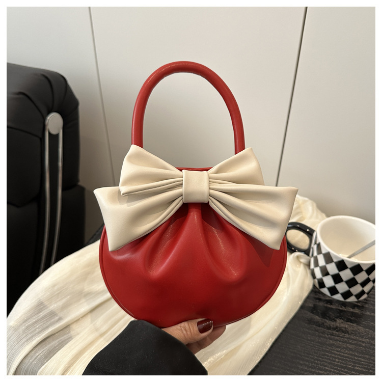 This Year's Trendy Niche Designer Mini Bowknot Color-Blocked Handbag for Women 2024 New Bowling Bag This Year's Trendy Niche Designer Mini Bowknot Color-Blocked Handbag for Women 2024 New Bowling Bag
