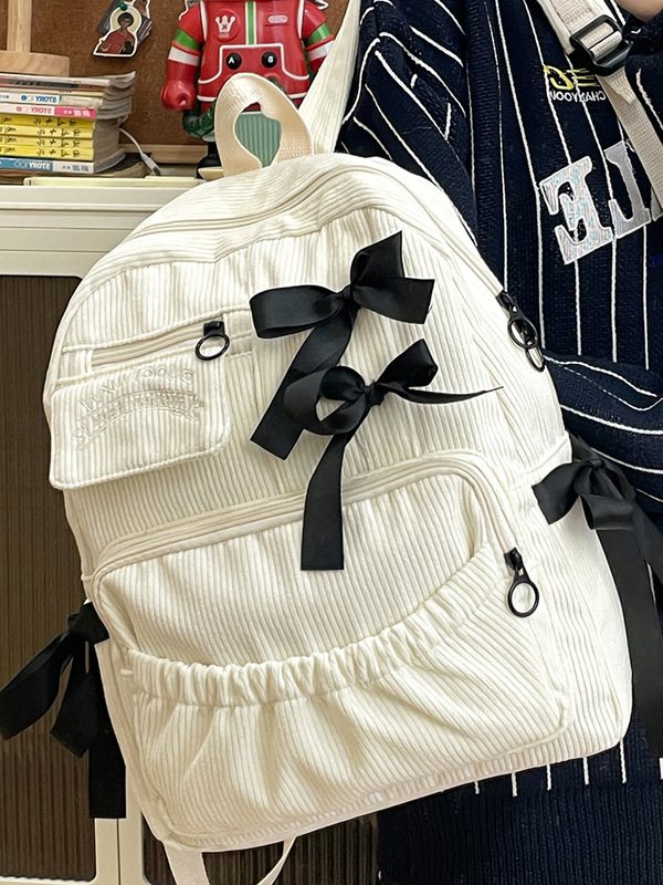 コーデュロイ中学高校の学生はランドセル学校のins風の甘い蝶結びの大容量の韓国版のかばんを合わせます。|undefined