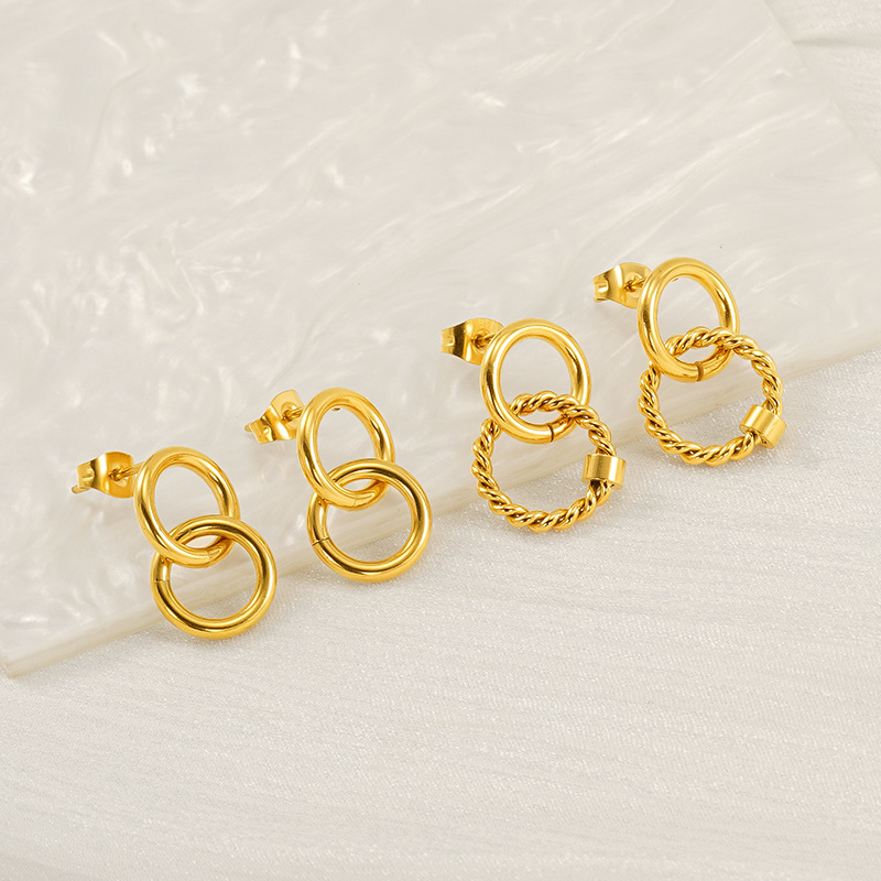 Pendientes de oro de 18k estilo INS Pendientes de anillo de tamaño de acero inoxidable Pendientes de acero de titanio entrelazados de anillo femenino Pendientes de acero femenino