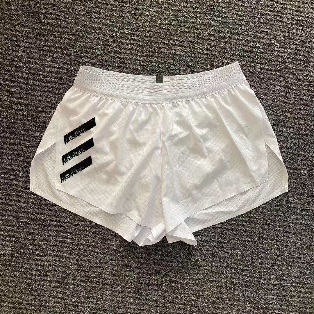 スポーツランニング三分トレーニングパンツ男性プロマラソン側開帯ライニング速乾通気陸上パンツ