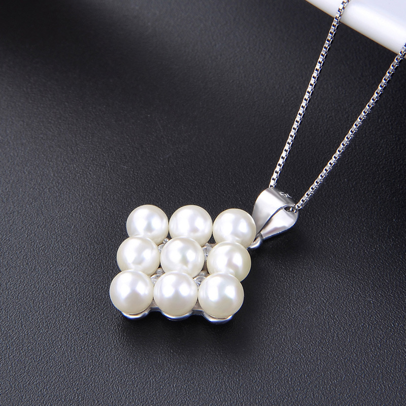 Jiaojiao amor S925 plata esterlina colgante de diamantes para mujeres europeas y americanas estilo cadena de clavícula moda collar de perlas al por mayor