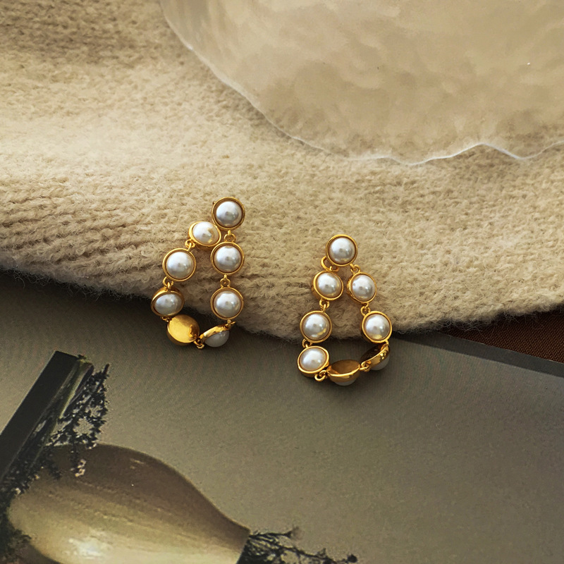 Mode Runden Kupfer Ohrringe Überzug Künstliche Perlen Kupfer Ohrringe display picture 5