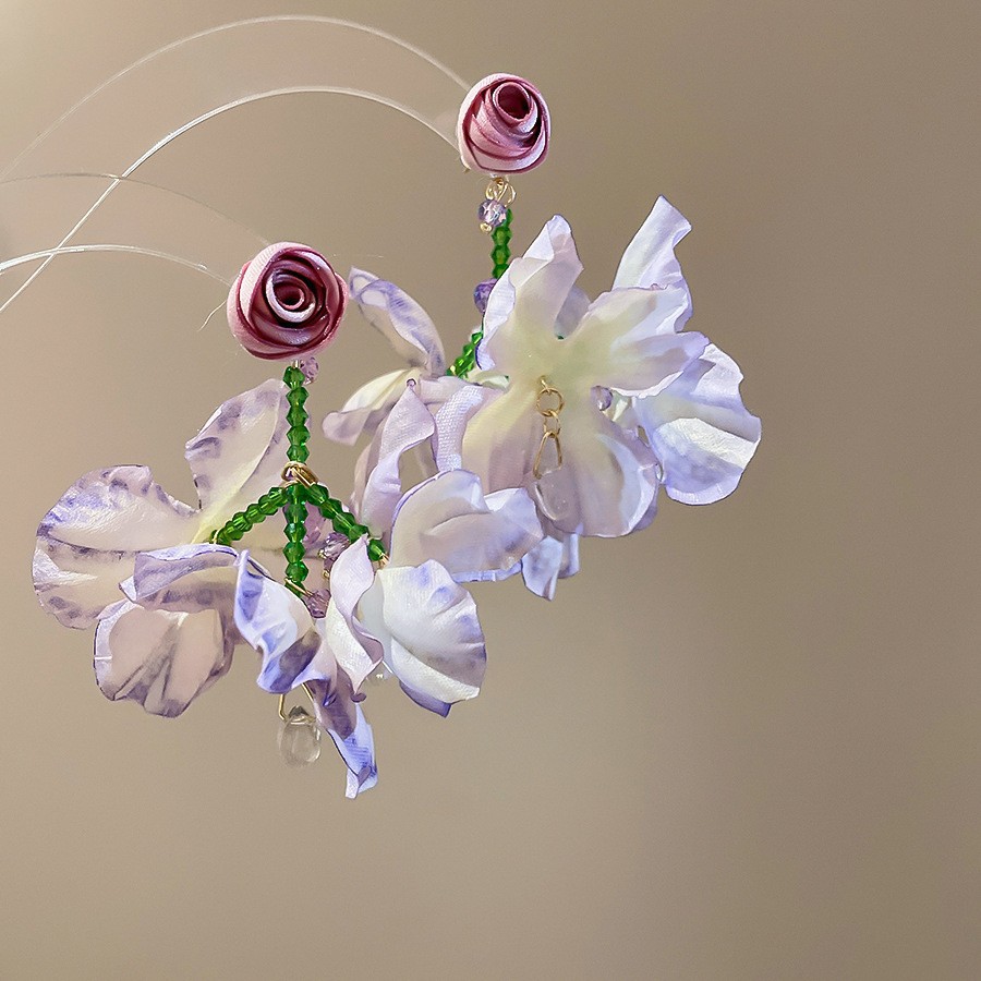 Pendientes de borla de flores de gasa de aguja de plata Pendientes de dopamina de bosque dulce Pendientes de todo fósforo de tendencia de nicho Mujeres al por mayor