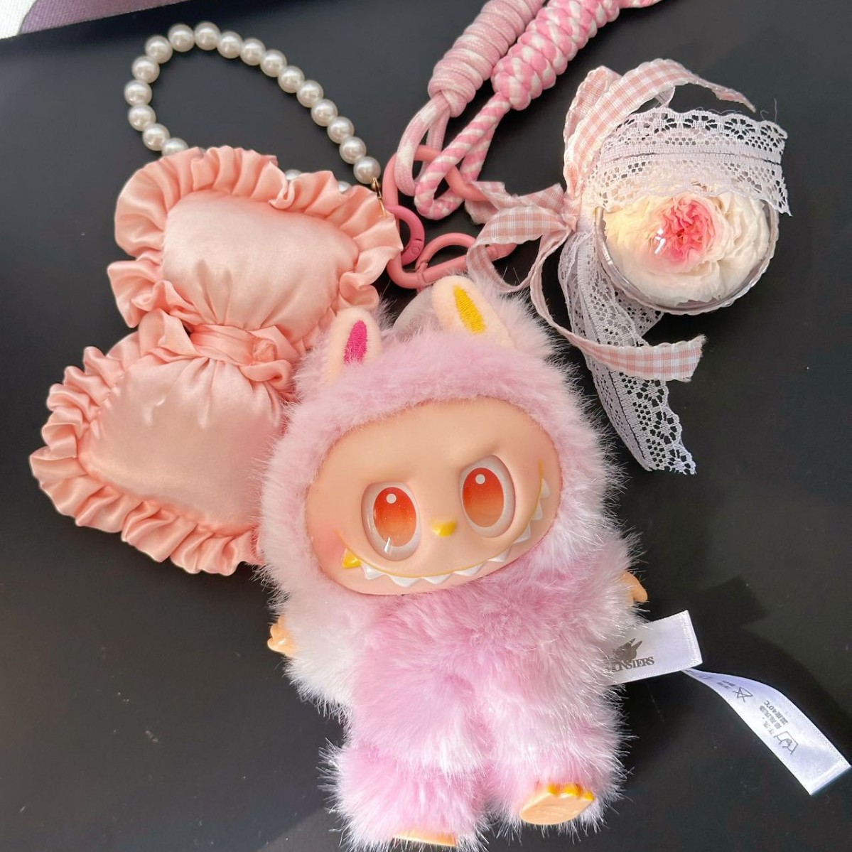 핑크색 천 가방 걸이