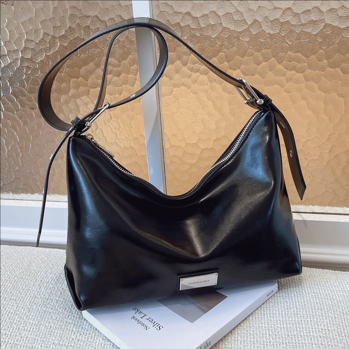 Nicho transfronterizo bolsos debajo de la axila mujeres otoño / invierno 2025 nuevo bolso de moda bolso de hombro retro bolso de mochila versátil