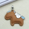 Brown-colored horse with oil edges + silver tweets